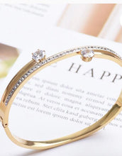 Load image into Gallery viewer, Crossover Gold Crystal Bangle
